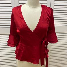 100% Polyester Red V-neck Tops For Brunch, Red V-neck Top For Brunch, Elegant Red Short Sleeve Blouse, Red Fitted Tops For Brunch, Fitted Red Tops For Brunch, Sleeveless High Neck Blouse, White Flowy Top, Crochet Lace Shorts, Coral Blouse