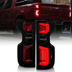 the tail lights of a red pickup truck