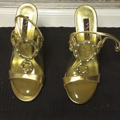 Gold Evening Party Sandal With 3 Inch Heel. Back Strip And Rhinestones Settings In Front Of Shoe Design. Never Worn. Some Marks From Setting In The Shoe Box Too Long. Gold Sandals With Rhinestones For Events, Gold Embellished Sandals For Events, Holiday Gold Embellished Heels, Gold Rhinestone Sandals For Formal Occasions, Gold Embellished Heels For Events, Festive Embellished Formal Sandals, Elegant Party Sandals For Festive Occasions, Elegant Party Sandals For Festive Season, Elegant Festive Party Sandals