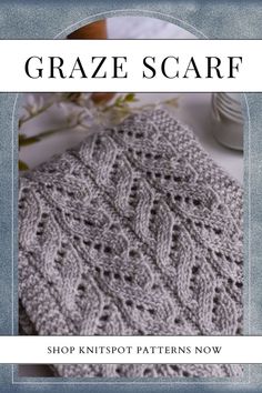 a close up of a knitted scarf with text overlay that reads, graze scarf knitting pattern