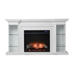 a white fireplace with an electric fire in it