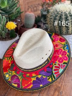 This beautiful Mexican Fedora is made out of Palm and has beautiful embroidered flowers. It is perfect to add that special touch to any outfit. The hat itself is made out of Palm and is very light and breathable. Find more colors here: https://www.etsy.com/es/listing/1004902053/sombrero-mexicano-de-palma-sombrero?ref=listing_published_alert Mexican Palm, Mexican Sombrero, Floral Hat, Traditional Mexican, Embroidered Hat, Embroidered Hats, Beautiful Hats, Chicago Il, Embroidered Flowers