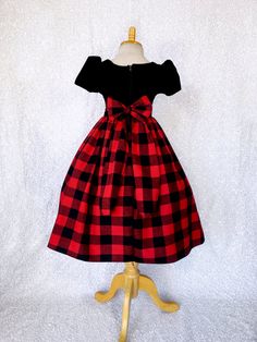 An elegant dress that's perfect for any occasion: wedding, christmas, birthday, or pageant! This dress is made out of a comfortable cotton plaid bottom and velvet top. The top comes with short sleeves and a zipper on the back. Attached to the waist are two strips of plaid fabric that can be used to tie together into a bow at the back for a comfortable and snug fit. The plaid skirt has a layer of layer of lining with crinoline attached to give the skirt some fullness. *Mannequin has petticoat to Pageant Photoshoot, Graduation Birthday Party, Gown Birthday, Cotton Gowns, Holiday Dress Outfit, Dress Graduation, Wedding Flower Girl, Velvet Top, Star Dress