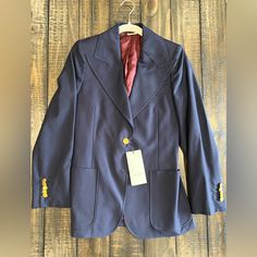 Women’s Gucci Uniform Sports Coat Size 36 (Please Note That The White Tag States That It’s A Size 38, But The Inside Pocket Tag States It’s 36.) Measurements Are Below: Seam From Collar To Shoulder: 4” Seam From Shoulder To Cuff: 23.5” Pit To Pit: 15.25” Buttoned Waist Width: 14.25” Total Length: 28” Blue Gucci Outerwear For Work, Classic Blue Gucci Outerwear, Gucci Notch Lapel Suits For Work, Gucci Notch Lapel Suit For Formal Occasions, Classic Tailored Gucci Suits, Classic Gucci Business Suits, Classic Gucci Suits For Business, Classic Fitted Gucci Suit, Elegant Gucci Business Suit