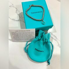 Brand New, Never Worn, Beaded Tiffany & Co Bracelet With Tiffany Blue Heart And Diamond. With Original Packaging: Box, Pouch, Authenticity Card, And White Ribbon. Tiffany Bead Bracelet, Tiffany And Co Bracelet, Tiffany Bracelets, Return To Tiffany, Box Pouch, Classic Bracelets, Ball Bracelet, Mesh Bracelet, Toggle Bracelet