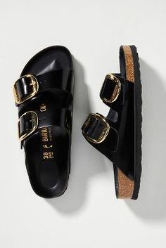 Shop the Birkenstock Big Buckle Arizona Patent Leather Sandals and more at Anthropologie today. Read customer reviews, discover product details and more. Gold Buckle Birkenstocks, Black Summer Shoes, Staple Shoes For Women, Birkenstock Big Buckle Outfit, Women’s Sandals, American Wardrobe, Birkenstock Big Buckle, Laidback Aesthetic, Spring Shoes Women