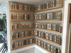 the shelves are filled with many different types of jars