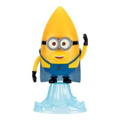 a yellow toy with glasses and overalls on it's head, standing in front of a white background