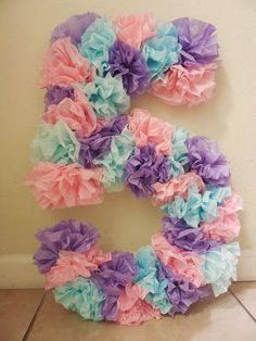 the letter e made out of tissue paper flowers