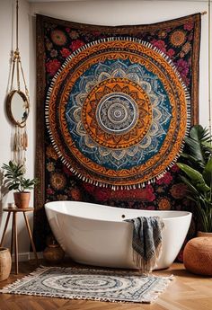 a bathtub in front of a tapestry hanging on the wall next to a potted plant