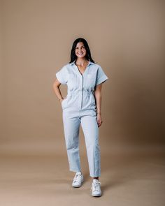 Introducing the Aspen Short Sleeve Jumpsuit, a contemporary take on classic utility wear. With its relaxed fit and short sleeves, it offers both comfort and functionality for everyday wear. The denim fabric adds a casual yet versatile touch, making it easy to dress up or down for any occasion. Whether you're running errands or meeting friends for brunch, the Aspen Short Sleeve Jumpsuit is the perfect choice for effortless style with a nod to heritage craftsmanship. Embrace the timeless appeal of