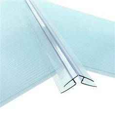 a close up view of the corner of a piece of clear plastic sheet with an angled end