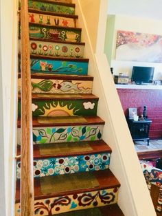 the stairs are painted with colorful designs