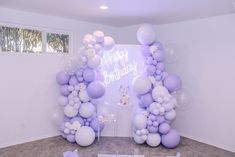 a birthday party with balloons and decorations