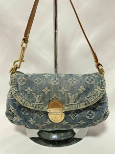 LOUIS VUITTON Mini Pleaty Hand Bag Shoulder Bag Monogram Denim Blue  M95050  Condition: Pre-owned, Very Good Colour:  Blue Size(inch): W9.84inch×H:7.08inch×D:2.75inch.  Size(cm): W27cm×H15cm×D8cm.  Shoulder strap drop  Thank you for watching. We will ship the item 3 business days after your payment clears. Shipping: Item will be shipped by FedEx or Yamato transport or Japan Post. You can choose a shipping method at checkout. Please contact us for bulk shipping. Please Note : Import duties, taxes Designer Denim Shoulder Bag With Branded Hardware, Luxury Denim Shoulder Bag With Detachable Strap, Vintage Louis Vuitton Bag, Lv Denim Bag, Louis Vuitton Denim Bag, Small Bag Outfit, Louie Bag, Louis Vuitton Jeans, Louise Vuitton