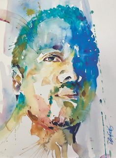 a watercolor painting of a man's face