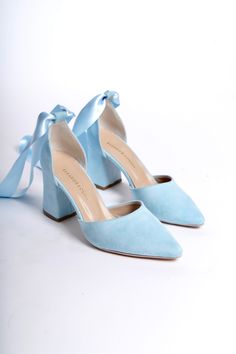 BLUE SUEDE SHOES, BLUE WEDDING SHOES, BLUE HIGH HEELS, BABY BLUE SHOES, WEDDING HEELS, BLUE BLOCK HEELS, BLUE BRIDAL SHOES, ANKLE STRAP HEEL

As Eleanor Louise, we stand out with our Baby Blue heeled shoes that combine style and comfort. Specifically designed for brides, these shoes are crafted with high-quality materials.

• Made from Blue Suede and Premium Vegan Leather, our shoes are equipped with an ankle strap that provides comfort throughout the day.

• Completing your style and boosting your confidence is the most elegant way! Blue Suede 3.15-inch (8 cm) high-heeled shoes offer elegance and chicness with every step. Whether it's for daily wear or a special event, these shoes not only add height but also provide a sophisticated touch to your style. Baby Blue Shoes High Heels, Pastel Blue Heels, Wedding Heels Blue, Blue Shoes Wedding, Blue Heels Outfit, Wedding Shoes Blue, Baby Blue Shoes, Baby Blue Heels, Shoes Wedding Heels