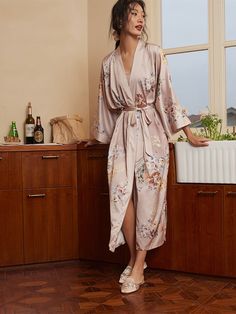 Crafted with meticulous attention to detail, our kimono robe embodies the essence of Eastern luxury, offering you a truly indulgent experience every time you slip it on. Its versatile design effortlessly transitions from leisurely mornings to elegant evenings, ensuring you stay elegant and refined throughout the day. • Silky Comfort: Made of high-quality polyester charmeuse, our robes are soft, lightweight and cooling for summer. They have a smooth and breathable texture that feels just like nat Elegant Sleepwear With Kimono Sleeves For Spring, Elegant Spring Sleepwear With Kimono Sleeves, Elegant Spring Kimono For Sleep, Elegant Spring Kimono For Home, Elegant Spring Loungewear Robe, Elegant Spring Home Robe, Elegant Sleepwear With Kimono Sleeves For Loungewear, Elegant Cream Sleepwear For Home, Elegant Spring Sleep Robe