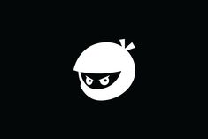 a black and white logo with an angry face