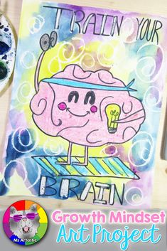 an art project with the words train your brain and a drawing of a cartoon character