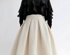 <Size>

 *Unit: cm 







 size 

 Waist 

 Length 











 S 

 64 

 68 






 M 

 68 

 68 






 L 

 72 

 69 






 XL

  76 

 69 






 2XL 

 80 

 70 













 <Material> 



 Wool Blend Chic Winter A-line Pleated Skirt, Feminine Ruffled Skirt For Fall, Chic White Pleated Skirt For Fall, Cream Lined Skirt For Fall, Chic A-line Winter Mini Skirt, Elegant A-line Skirt With Ruffles, Elegant Cream Mini Skirt For Spring, Elegant Full Mini Skirt For Spring, Fall Ruffled Beige Skirt