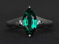 Welcome to my shop, you can find many beautiful gemstone jewelry here, and you also can ask for customized service. Main Stone: lab emerald, marquise cut, measures 6X12mm; Accent Stones: cz Metal: 925 sterling silver plated with rhodium. I also can provide metal options such as 14k solid yellow/white/rose gold Setting: prong setting More rings please go to my shop home: https://www.etsy.com/shop/XCjewelryStudio?ref=hdr_shop_menu It's a perfect gift for the person who was born in May (Birthstone) Emerald Engagement Ring Green, Meaningful Rings, Smaragd Ring, May Birthstone Rings, Ring Three Stone, Mystic Topaz Ring, Emerald Rings, Three Stone Ring, May Birthstone