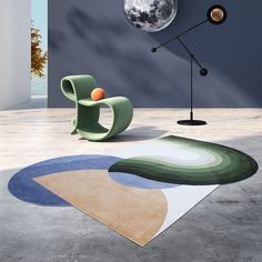 a living room with an abstract rug, chair and lamp on the floor in front of it