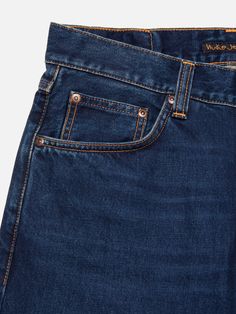 Regular-fit jeans featuring a tapered leg, washed to deep dark indigo shades with subtle abrasions and slightly contrasting wear marks. The denim used for these jeans has a slightly special making; the warp yarns are dyed to an intense indigo tone, and after weaving the entire denim has been surface-dyed again with indigo - further deepening the hue.  It is this special dyeing of the denim that gives these jeans their outstanding ink-like hue. Dark Indigo, Fit Jeans, Jeans Fit, Organic Cotton, Weaving, Shades, How To Wear