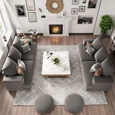 an overhead view of a living room with grey couches