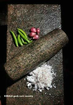 some food is laying out on the ground next to it's mortar and salt