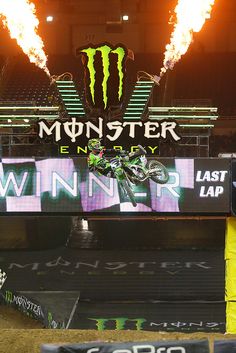 the monster energy winner sign is lit up