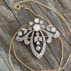 "Details: Edwardian Belle Époque diamond pendant from the early 1900's. There is a count of 50 diamonds, the largest being 5mm close to 1/2 carat. There are 5 large bezel set Old European Cut diamonds and the balance are bead set and bezel set rose cut diamonds. Mille grain work on all edges is meticulously finished. The center five diamonds move independently of the surround. A very pretty piece in excellent condition. The gold pendant tests at 18K and the 16\" modern chain is 14K gold. The pin Large Locket, Cameo Earrings, Elegant Pendant, European Cut Diamonds, Lovely Ring, Rose Cut Diamond, Gorgeous Necklaces, Rose Cut, White Gold Rings