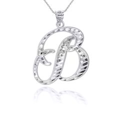 Description: 925 Sterling Silver Cz Cut Cursive Initial “B” Letter Pendant Necklace Item No.: Ba210* Metal Type: 925 Sterling Silver With Stamped 925 Metal Color: Silver Measurement: Pendant's Height With Bale: 1.11 In Width: 0.81 Inchess Available In Any Letter From A-Z Rolo Chain Available In 16", 18", 20", 22" Brand New Made To Order. Please Allow 3-5 Days To Be Shipped. Silver Initial Pendant With Diamond Cut, Silver Pendant Initial Necklace In Fine Jewelry, Silver Sterling Silver Initial Necklace, Hallmarked Silver Initial Pendant Necklace, Silver Hallmarked Initial Pendant Necklace, Silver Monogram Fine Jewelry, Fine Jewelry Silver Monogrammed Jewelry, Fine Silver Monogram Jewelry, Monogrammed Silver Fine Jewelry