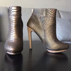 Stunning Ankle Boots In A Metallic, Textured Reptile-Skin Print, Real Leather. The Color Is Iridescent-Like And I Would Describe It As A Dirty Bronze With Khaki Or Olive Green. I Bought On Poshmark And Have Never Used Them. Overall The Condition Is Great With Wear Only On The Soles. Heel Is 4.5" With .5" Platform. Luxury Chic Wedge Boots For Party, Snake Boots, Reptile Skin, Badgley Mischka Shoes, Green I, Badgley Mischka, Real Leather, Olive Green, Bootie Boots