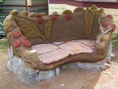 a bench made out of wood and stone