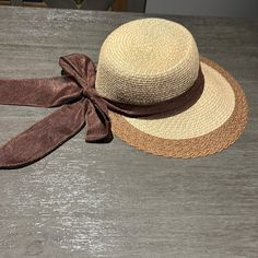 Cute Straw Hat With Dark Brown Bow Detail. Never Worn Vintage Beach Visor Hat, Brown Summer Visor Hat, Vintage Summer Visor Hat, Vintage Visor Hats For Summer, Vintage Brown Sun Hat For Vacation, Brown Straw Hat For Spring, One Size Fits Most, Brown Straw Hat One Size For Spring, Vintage Brown Bucket Hat For Beach, Vintage Brown Bucket Hat For The Beach