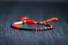 Multicolored bracelets with lucky Buddhist Tibetan knots, handcrafted according to Buddhist tradition ✿ History ✿ The Buddhist tradition of these very special bracelets has its origin in Buddhist temples, where Tibetan monks perform each knot while reciting mantras that infuse intention. Full awareness in this meditative act achieves that the high vibration is transmitted to the bracelets and attract luck and the most positive things to our lives. Their popularity causes them to be chosen by fam Traditional Handmade Bracelets For Good Luck, Handmade Casual Braided Bracelets For Meditation, Traditional Beaded Friendship Bracelets, Traditional Braided Bracelets For Gifts, Traditional Braided Bracelets As Gifts, Handmade Bohemian Friendship Bracelets For Good Luck, Traditional Beaded Bracelets With Sliding Knot For Gift, Traditional Hand Wrapped Braided Bracelet For Friendship, Traditional Hand-wrapped Braided Bracelet For Friendship