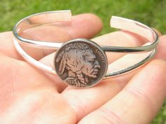 Authentic Buffalo Indian Nickel coins soldered silver plated brass base cuff bracelet. Rare year are different price. Life time guaranty if the coin take of from bracelet will be repair. Silver plated cuff bracelet it fits 6 to 7.5 inch wrist size. Comes in gift box. Please check my other items . Antique Silver Round Cuff Bracelet As Gift, Antique Silver Round Cuff Bracelet Gift, Unique Nickel-free Round Cuff Bracelet, Unique Nickel-free Cuff Bracelet, Vintage Sterling Silver Nickel-free Cuff Bracelet, Vintage Nickel-free Sterling Silver Cuff Bracelet, Antique Adjustable Nickel-free Cuff Bracelet, Vintage Nickel-free Antique Silver Cuff Bracelet, Vintage Stamped Round Cuff Bracelet