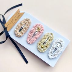 Girls' Beaded Crochet Hair Clips | Hand-Embellished Snap Clips for Weddings, Christenings, Parties Length: 6 cm Please let me know your choice of design in the Personalisation box, choose from: 1-4, see photos for details. Check out Hair Accessories shop section HERE: https://www.etsy.com/shop/HyggeMaiden?section_id=49452630 Handcrafted Design: Each clip is individually crocheted and embellished by hand, ensuring every piece is one of a kind. Elegant Embellishments: Adorned with a variety of beads and flowers, these clips bring a sparkle and delicate beauty to any hairstyle. Versatile Options: Choose from four stunning designs or treat your little one to the full set for a complete collection of beautiful clips. Perfect for Special Occasions: Ideal for weddings, christenings, birthday part Crochet Hair Clips, Hair Accessories Wedding, Crochet Hair Accessories, Beaded Crochet, Delicate Beauty, Accessories Wedding, Crochet Hair, Snap Clips, Bead Crochet