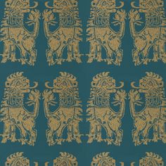 an intricately designed blue and gold wallpaper with two lions on the left side