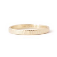 Hammered by hand in our Vermont studio, this wedding ring delivers everything that is timeless and classic about a simple forged gold band but with an organic feel. Our ethical sourcing and human-to-human communication ensure this symbol of your love is made with love every step of the way! Band and Width: A half-round 2mm, or 5mm wide band. Measuring approximately 1.55mm off the finger.Metal: Pictured here in 14k rose gold and 14k yellow gold with a cross-peen "thatched" texture. Sourcing note: Multiple Rings, Rings Cool, One Ring, Wide Bands, Types Of Rings, Multi Stone Ring, Perfect Ring, Gold Bands, Stone Rings