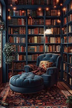 a blue chair sitting in front of a bookshelf filled with lots of books