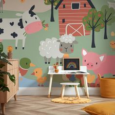 a child's room with farm animals painted on the wall and wooden flooring