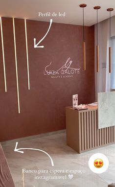 the inside of a salon with different lighting fixtures and signs on the wall above it