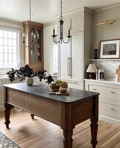 a large kitchen island in the middle of a room