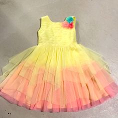 Nwot Beautiful Girls Dress. Buttons Up The Back And Ties. Flowers Connected. No Smoke No Pets Multicolor Spring Tutu Dress For Dress-up, Pink Twirl Dress For Play In Spring, Cute Yellow Tutu Dress For Spring, Multicolor Sleeveless Tutu Dress For Spring, Multicolor Sleeveless Spring Tutu Dress, Pink Ruffled Tutu Dress For Play, Spring Playtime Ruffle Tutu Dress, Spring Playtime Tutu Dress With Ruffles, Pink Tutu Dress For Play In Spring