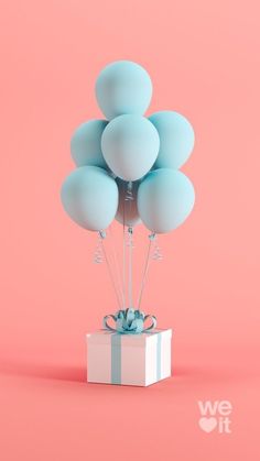 a bunch of blue balloons are in a gift box on a pink background with the words we love it