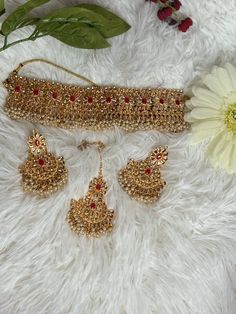 This set is perfect for wedding/ receptions 🤩 Gold Wedding Sets With Matching Earrings, Hand Set Bridal Sets For Festive Party, Bollywood Style Tilla Bridal Sets For Formal, Elegant Hand Set Lehenga For Wedding, Elegant Tilla Wedding Sets, Elegant Wedding Sets With Tilla Details, Elegant Party Tikka With Hand Set Details, Bollywood Bridal Earrings Hand Set For Wedding, Wedding Bridal Earrings With Tilla