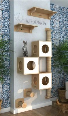 the cat tree is made out of cardboard boxes and has several shelves on each side