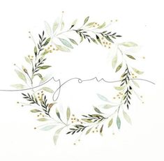 a watercolor wreath with the word joy written in cursive writing on it